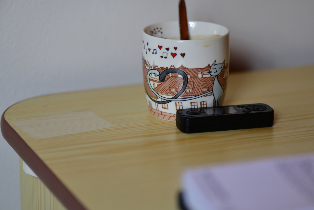 coffee mug, stirring spoon, tv remote control, evening snack, sleep, late night snack